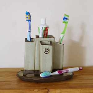 Squared toothbrushes container,