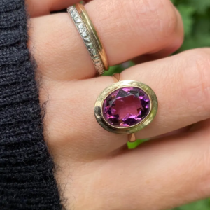 gold and purple paste ring